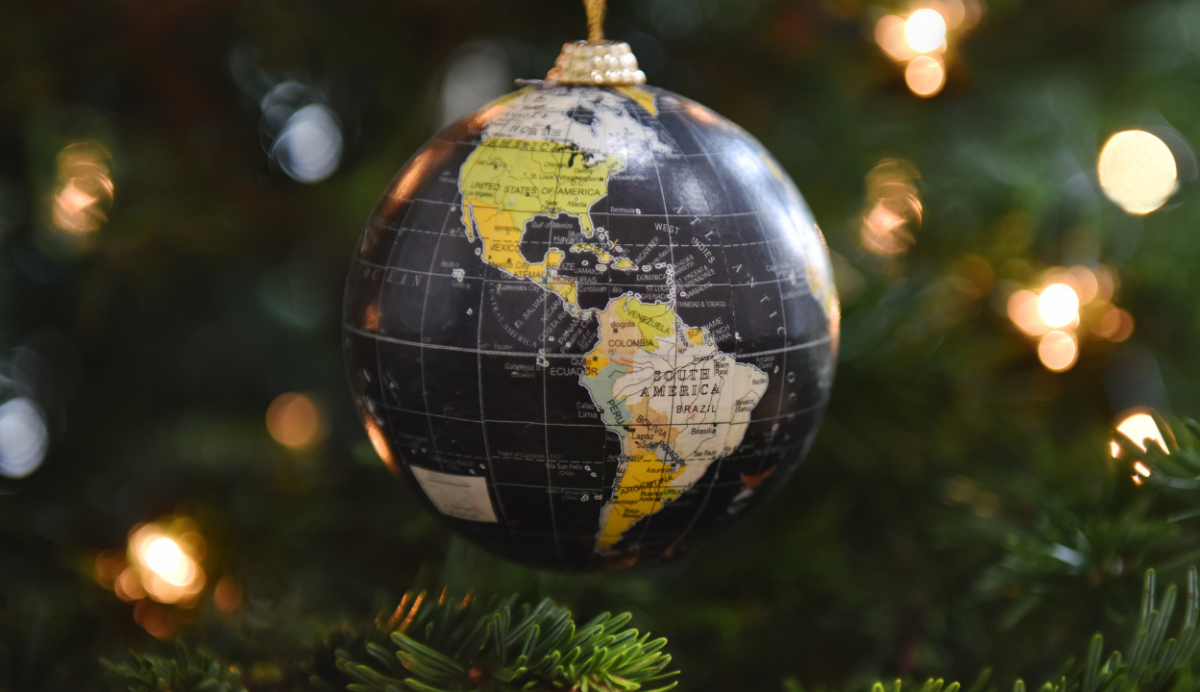 Globe bauble hanging from a Christmas tree.