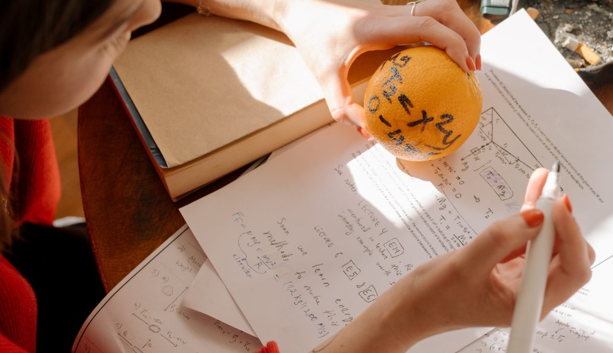 Picture of student studying for maths exam - Photo by cottonbro from Pexels