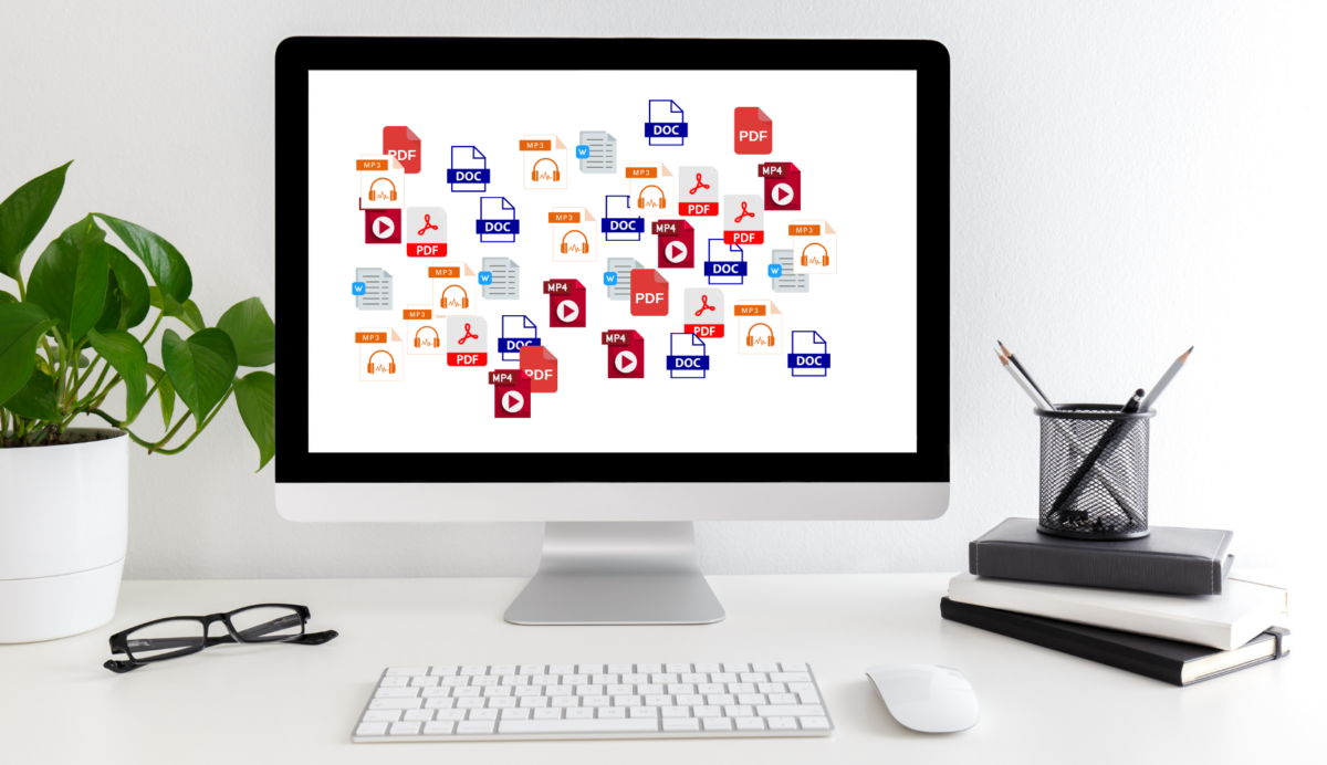 A disorganised desktop containing many different file formats.