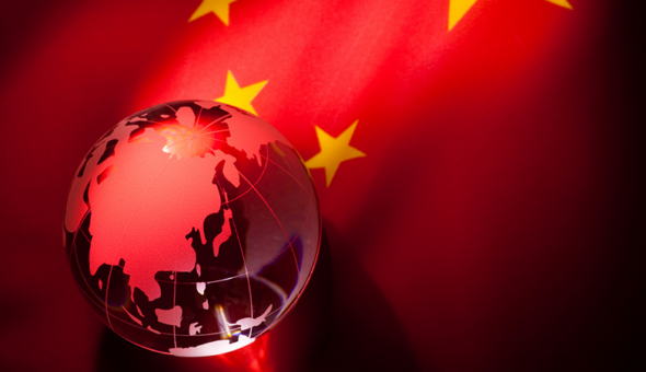 A Chinese flag with a globe showing China
