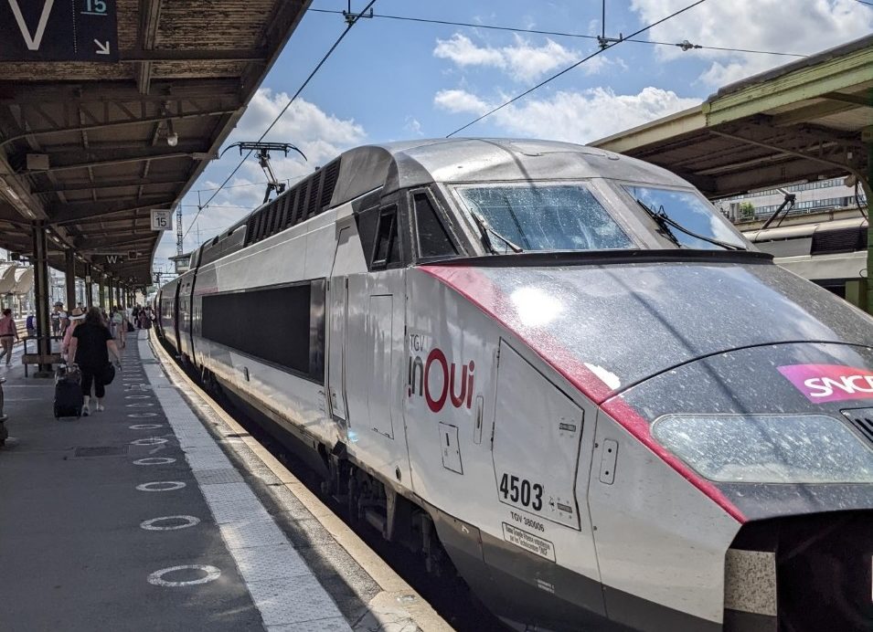 A modern train at a station in Europe
