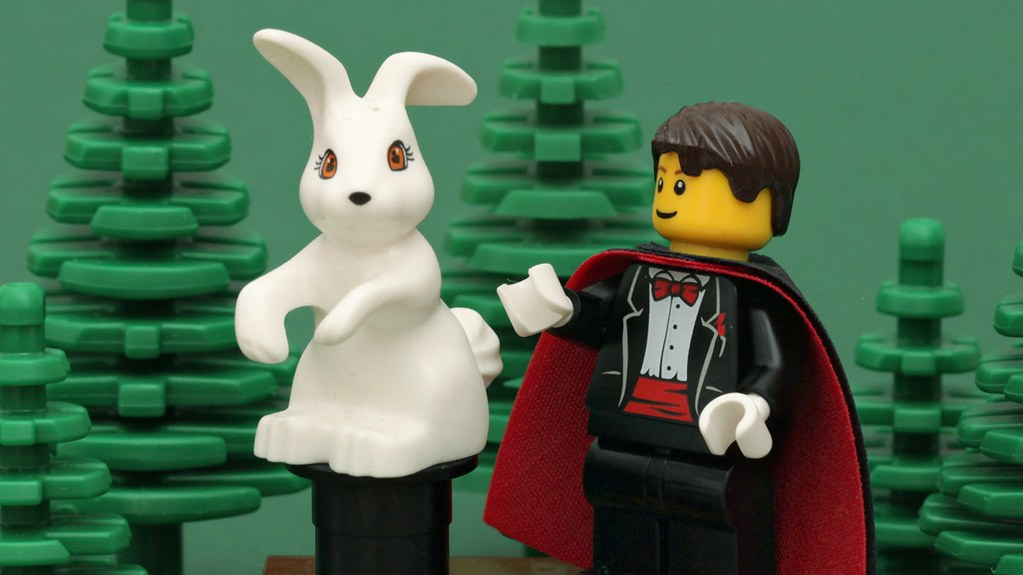 Lego minifig performs rabbit in the hat magic trick