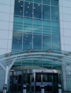 Rainscreen cladding and glass facade