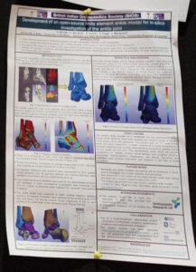Photograph showing our poster presentation on the wall at the conference