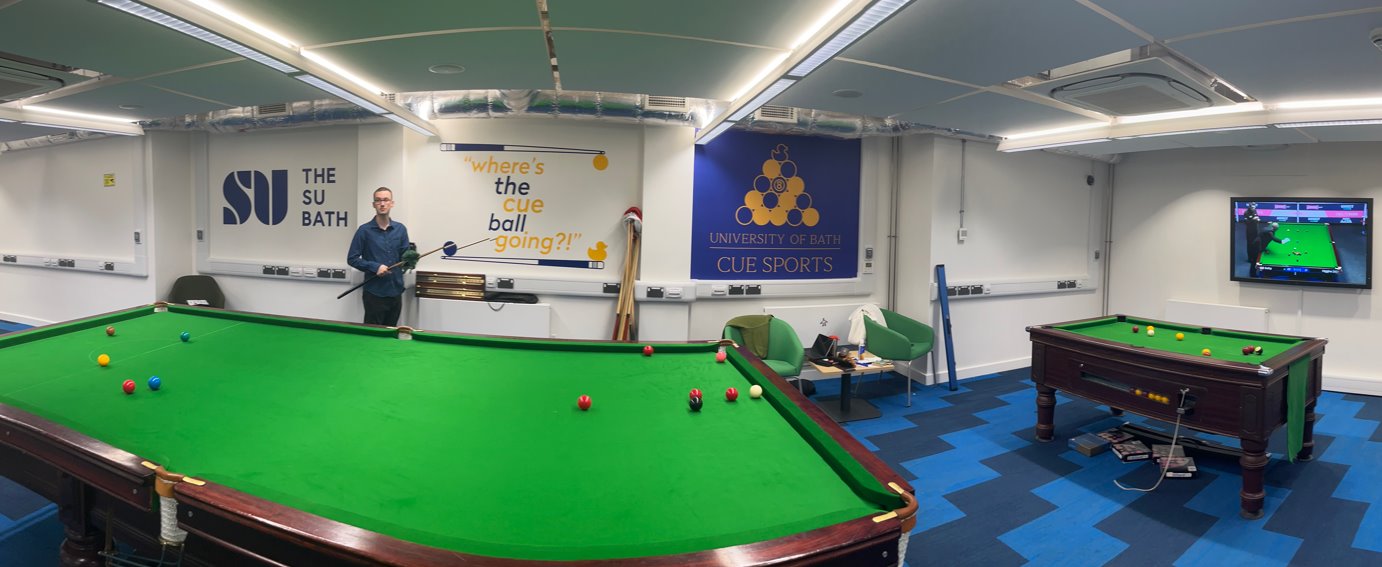 A pool table in a room