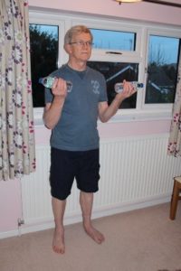 Modelling our (home made) water bottle bicep curl!