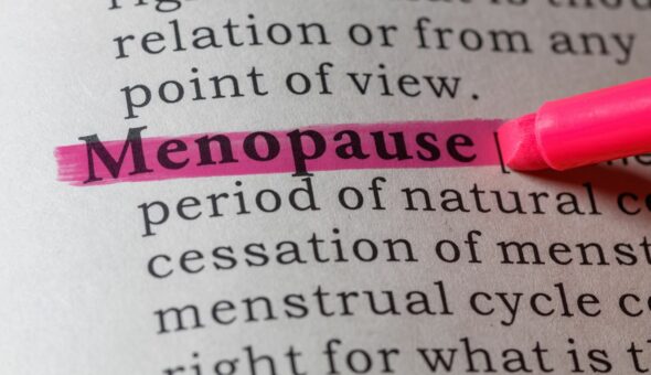 Image of the dictionary definition of menopause, highlighted in pink pen