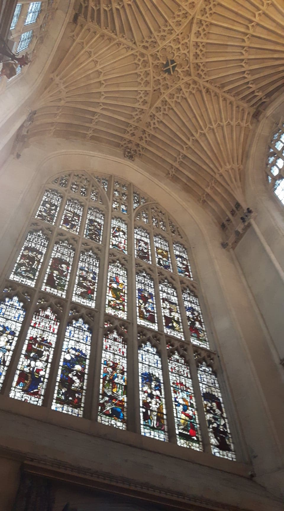 The stained glass inside Bath Abbley - looking up