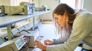 Female student working in one of the physics labs in Bath University