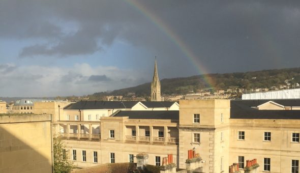 View of the citbuuildings with a rainbow.