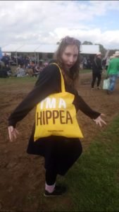 Myself posing with a bag that says "i'm a hippea". 
