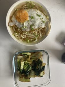 Noodle soup with egg and vegetables.