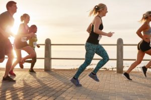An image showing people running for mental wellbeing.