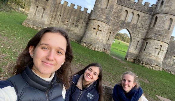 three female students taking a selfie in frotnt of Sham Castle