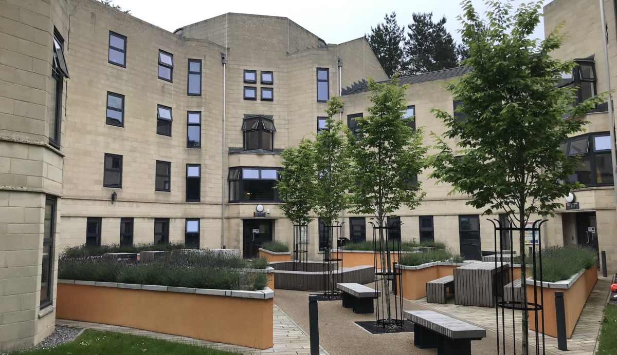 Brendon Court, a 4 story building, is pictured from the front.