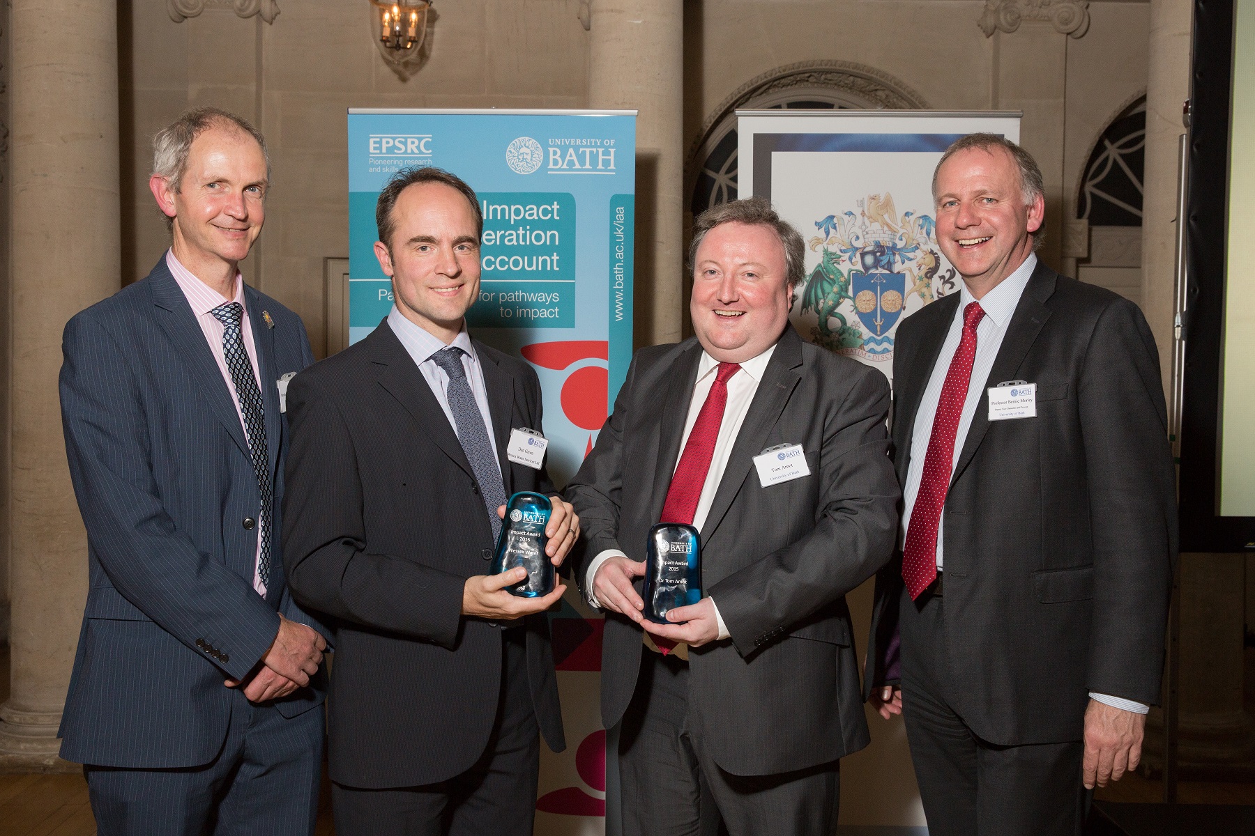 The annual Impact Celebration Dinner, presentations and awards, held at The Assembly Rooms, Bath. (L-R) Professor Jonathan Knight with winners Dan Green of Wessex Water and Tom Arnot of University of Bath holding their trophies with Professor Bernie Morley.
